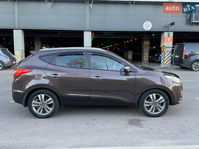 Коричневий Хендай іх35, об'ємом двигуна 2 л та пробігом 176 тис. км за 14500 $, фото 71 на Automoto.ua