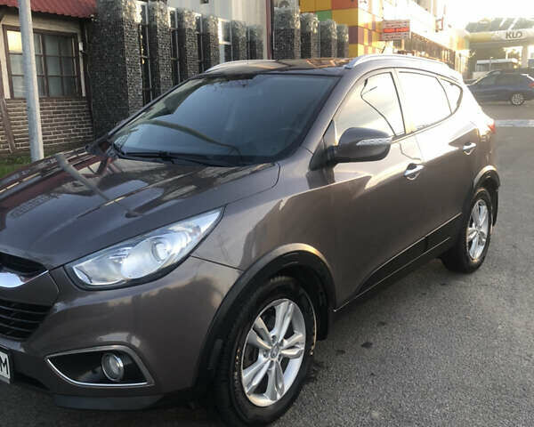 Коричневий Хендай іх35, об'ємом двигуна 2 л та пробігом 191 тис. км за 12500 $, фото 12 на Automoto.ua