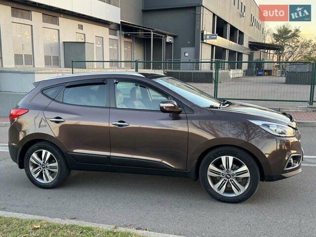 Коричневий Хендай іх35, об'ємом двигуна 2 л та пробігом 176 тис. км за 14500 $, фото 16 на Automoto.ua