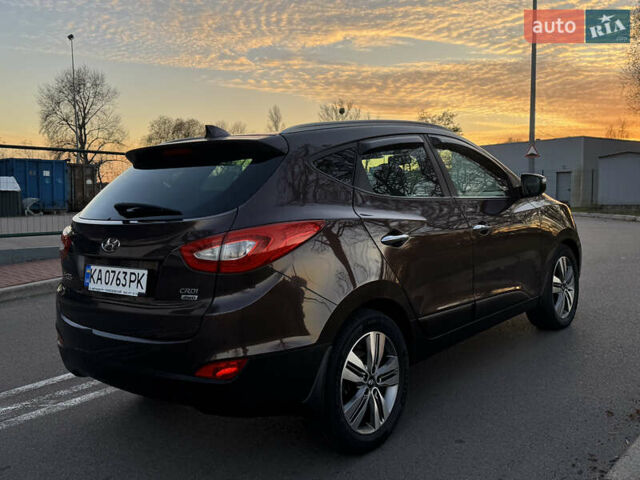 Коричневий Хендай іх35, об'ємом двигуна 2 л та пробігом 176 тис. км за 14500 $, фото 13 на Automoto.ua