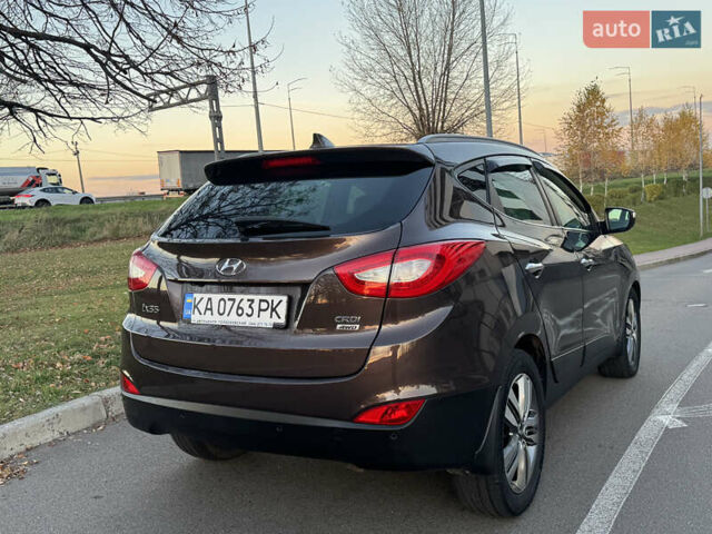 Коричневий Хендай іх35, об'ємом двигуна 2 л та пробігом 176 тис. км за 14500 $, фото 5 на Automoto.ua