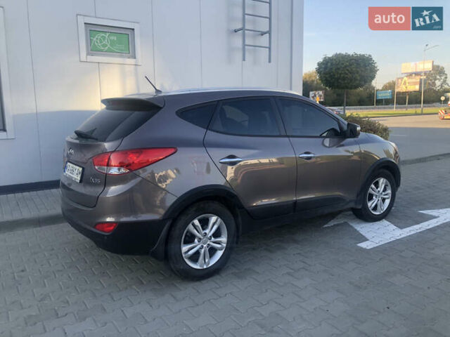 Коричневий Хендай іх35, об'ємом двигуна 2 л та пробігом 191 тис. км за 12500 $, фото 5 на Automoto.ua
