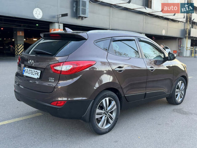 Коричневий Хендай іх35, об'ємом двигуна 2 л та пробігом 176 тис. км за 14500 $, фото 73 на Automoto.ua