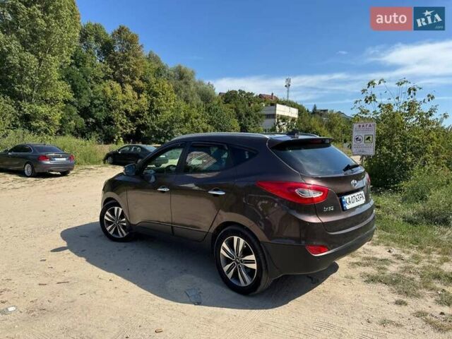 Коричневий Хендай іх35, об'ємом двигуна 2 л та пробігом 175 тис. км за 14970 $, фото 5 на Automoto.ua