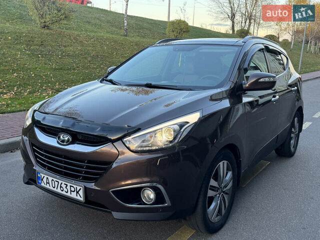 Коричневий Хендай іх35, об'ємом двигуна 2 л та пробігом 176 тис. км за 14500 $, фото 91 на Automoto.ua