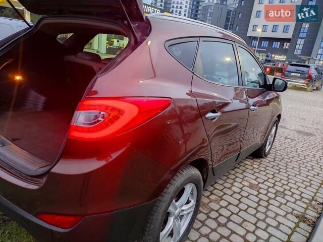 Коричневий Хендай іх35, об'ємом двигуна 2 л та пробігом 176 тис. км за 13700 $, фото 9 на Automoto.ua