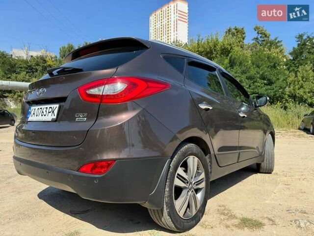Коричневий Хендай іх35, об'ємом двигуна 2 л та пробігом 175 тис. км за 14970 $, фото 3 на Automoto.ua