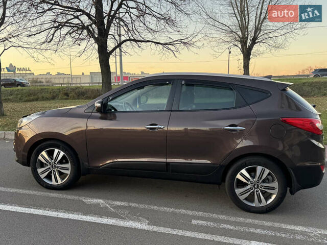 Коричневий Хендай іх35, об'ємом двигуна 2 л та пробігом 176 тис. км за 14500 $, фото 10 на Automoto.ua