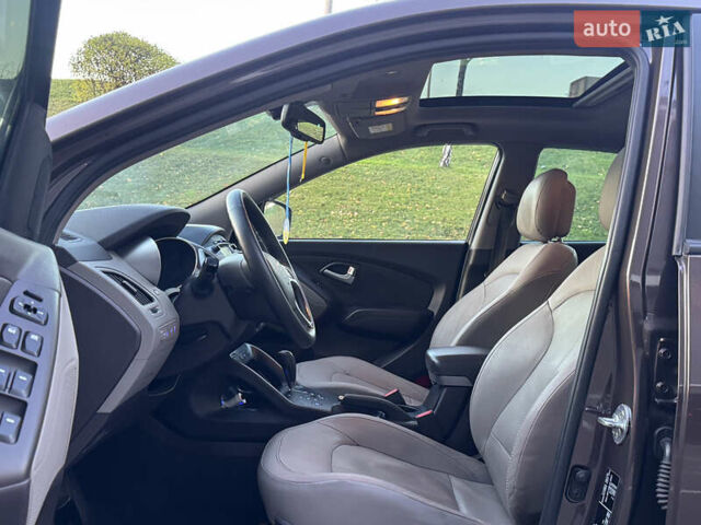 Коричневий Хендай іх35, об'ємом двигуна 2 л та пробігом 176 тис. км за 14500 $, фото 29 на Automoto.ua