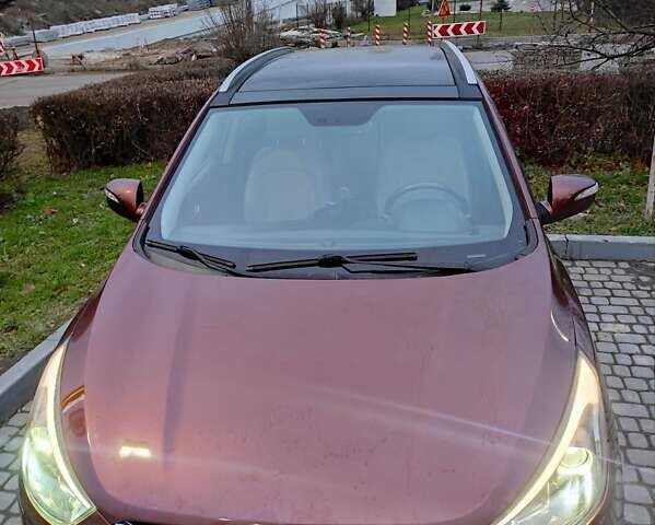 Коричневий Хендай іх35, об'ємом двигуна 2 л та пробігом 176 тис. км за 13700 $, фото 12 на Automoto.ua