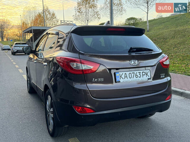 Коричневий Хендай іх35, об'ємом двигуна 2 л та пробігом 176 тис. км за 14500 $, фото 90 на Automoto.ua
