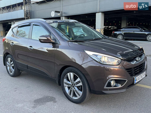 Коричневий Хендай іх35, об'ємом двигуна 2 л та пробігом 176 тис. км за 14500 $, фото 66 на Automoto.ua