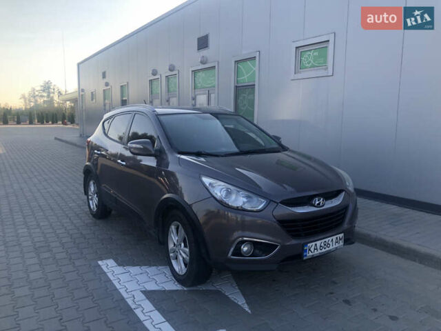 Коричневий Хендай іх35, об'ємом двигуна 2 л та пробігом 191 тис. км за 12500 $, фото 2 на Automoto.ua
