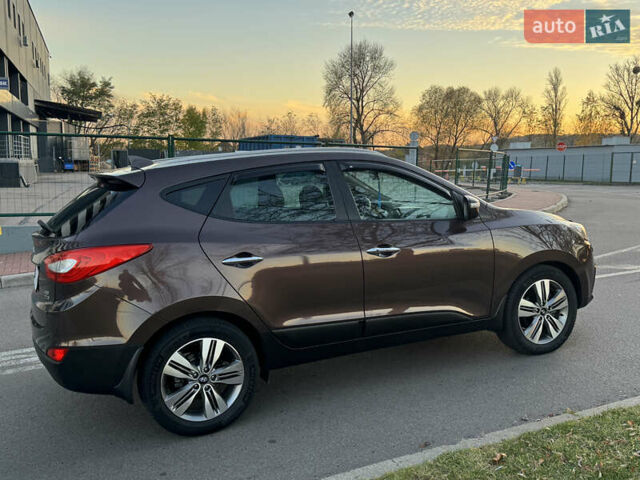 Коричневий Хендай іх35, об'ємом двигуна 2 л та пробігом 176 тис. км за 14500 $, фото 12 на Automoto.ua