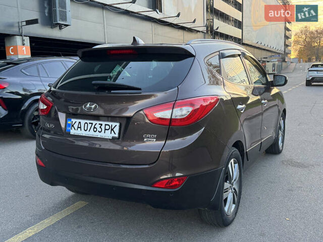 Коричневий Хендай іх35, об'ємом двигуна 2 л та пробігом 176 тис. км за 14500 $, фото 77 на Automoto.ua