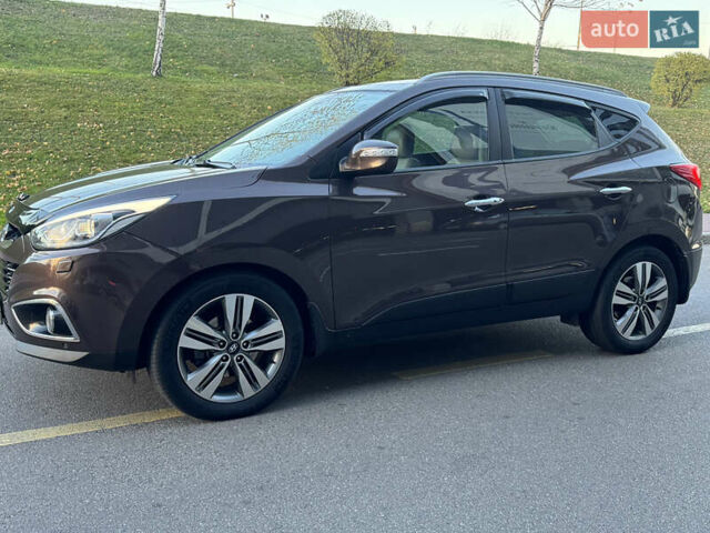 Коричневий Хендай іх35, об'ємом двигуна 2 л та пробігом 176 тис. км за 14500 $, фото 72 на Automoto.ua