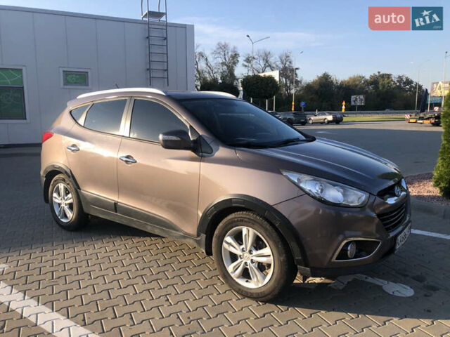 Коричневий Хендай іх35, об'ємом двигуна 2 л та пробігом 191 тис. км за 12500 $, фото 7 на Automoto.ua