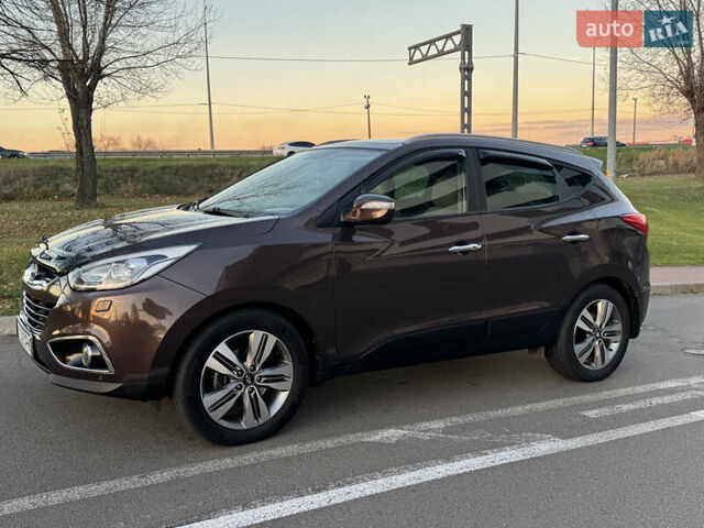 Коричневий Хендай іх35, об'ємом двигуна 2 л та пробігом 176 тис. км за 14500 $, фото 9 на Automoto.ua