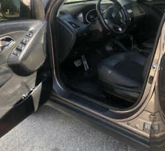 Коричневий Хендай іх35, об'ємом двигуна 2 л та пробігом 191 тис. км за 12500 $, фото 16 на Automoto.ua