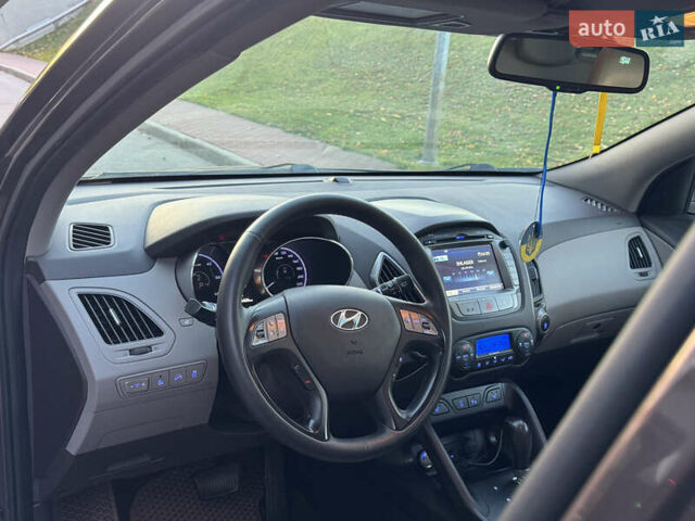Коричневий Хендай іх35, об'ємом двигуна 2 л та пробігом 176 тис. км за 14500 $, фото 28 на Automoto.ua