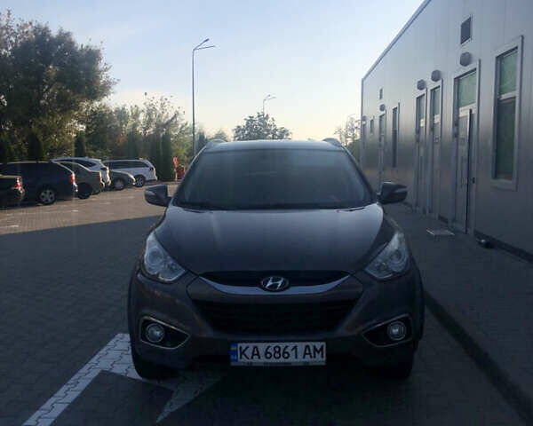 Коричневий Хендай іх35, об'ємом двигуна 2 л та пробігом 191 тис. км за 12500 $, фото 1 на Automoto.ua