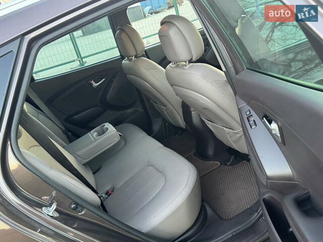 Коричневий Хендай іх35, об'ємом двигуна 2 л та пробігом 176 тис. км за 14500 $, фото 82 на Automoto.ua