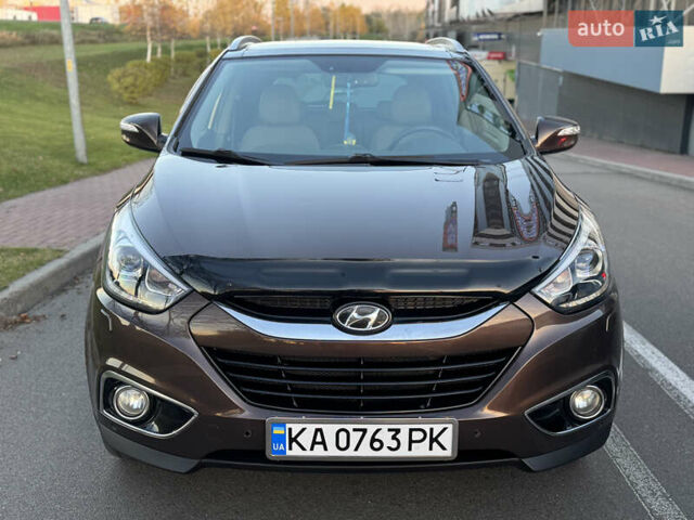 Коричневий Хендай іх35, об'ємом двигуна 2 л та пробігом 176 тис. км за 14500 $, фото 20 на Automoto.ua