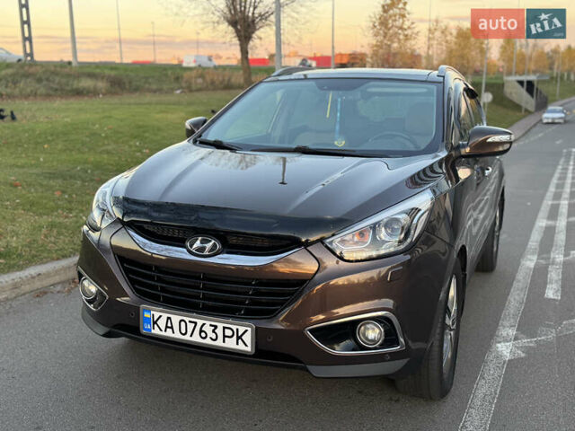 Коричневий Хендай іх35, об'ємом двигуна 2 л та пробігом 176 тис. км за 14500 $, фото 23 на Automoto.ua