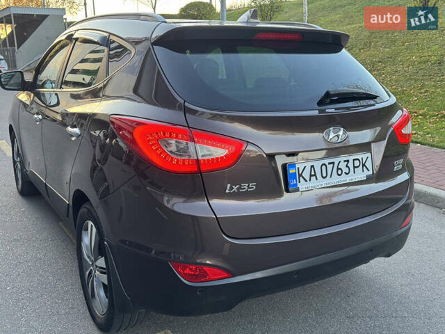 Коричневий Хендай іх35, об'ємом двигуна 2 л та пробігом 176 тис. км за 14500 $, фото 75 на Automoto.ua