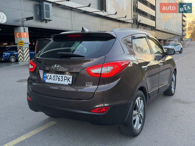 Коричневий Хендай іх35, об'ємом двигуна 2 л та пробігом 176 тис. км за 14500 $, фото 69 на Automoto.ua
