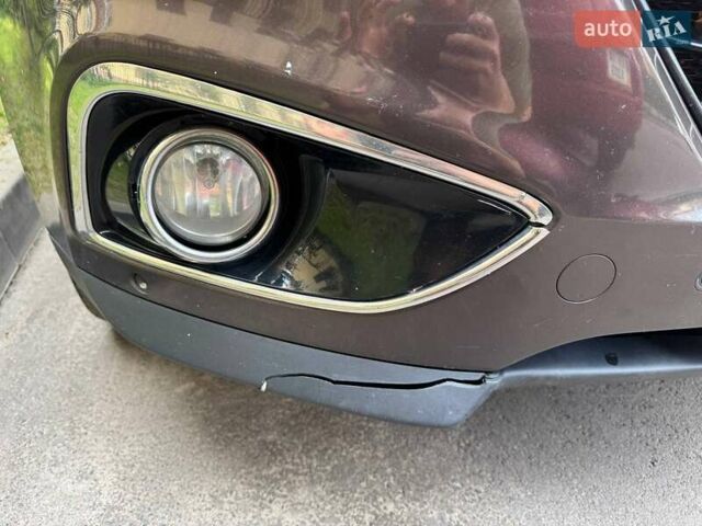 Коричневий Хендай іх35, об'ємом двигуна 2 л та пробігом 175 тис. км за 14970 $, фото 17 на Automoto.ua