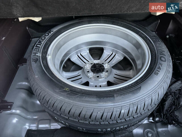 Коричневий Хендай іх35, об'ємом двигуна 2 л та пробігом 176 тис. км за 14500 $, фото 79 на Automoto.ua