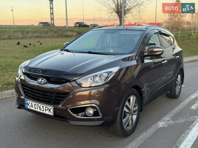 Коричневий Хендай іх35, об'ємом двигуна 2 л та пробігом 176 тис. км за 14500 $, фото 21 на Automoto.ua