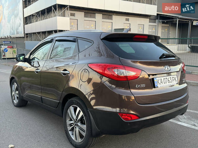 Коричневий Хендай іх35, об'ємом двигуна 2 л та пробігом 176 тис. км за 14500 $, фото 4 на Automoto.ua