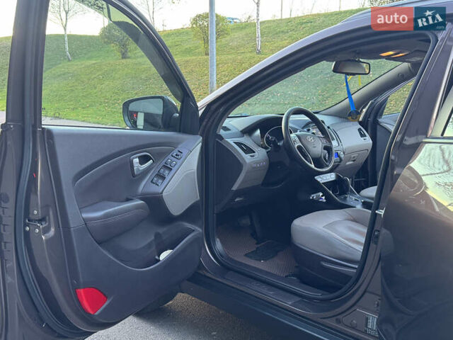 Коричневий Хендай іх35, об'ємом двигуна 2 л та пробігом 176 тис. км за 14500 $, фото 57 на Automoto.ua