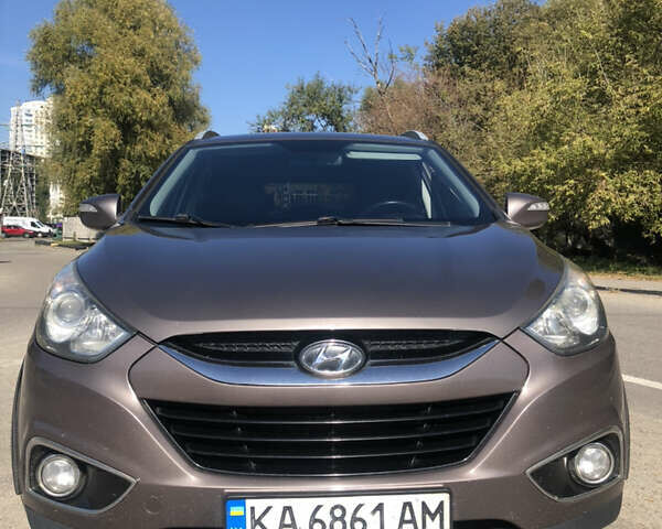 Коричневий Хендай іх35, об'ємом двигуна 2 л та пробігом 191 тис. км за 12500 $, фото 14 на Automoto.ua