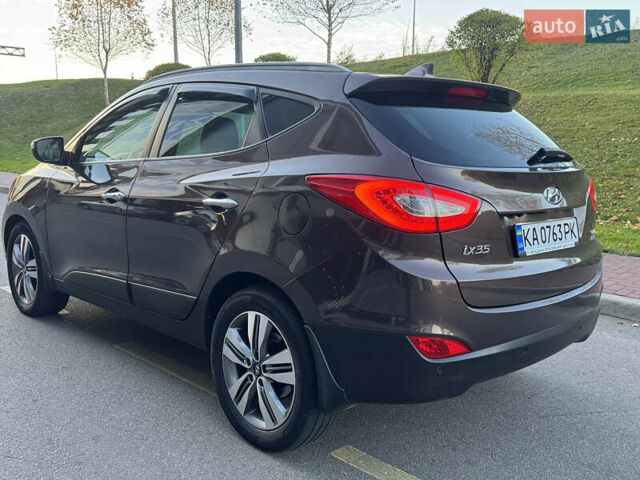 Коричневий Хендай іх35, об'ємом двигуна 2 л та пробігом 176 тис. км за 14500 $, фото 76 на Automoto.ua