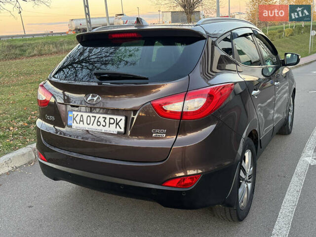 Коричневий Хендай іх35, об'ємом двигуна 2 л та пробігом 176 тис. км за 14500 $, фото 6 на Automoto.ua