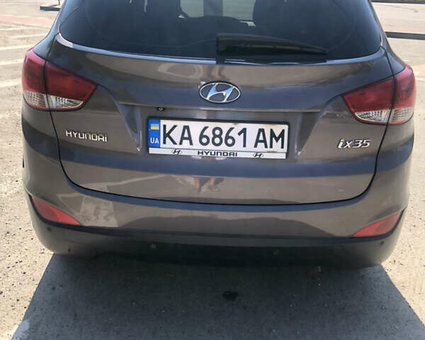Коричневий Хендай іх35, об'ємом двигуна 2 л та пробігом 191 тис. км за 12500 $, фото 15 на Automoto.ua
