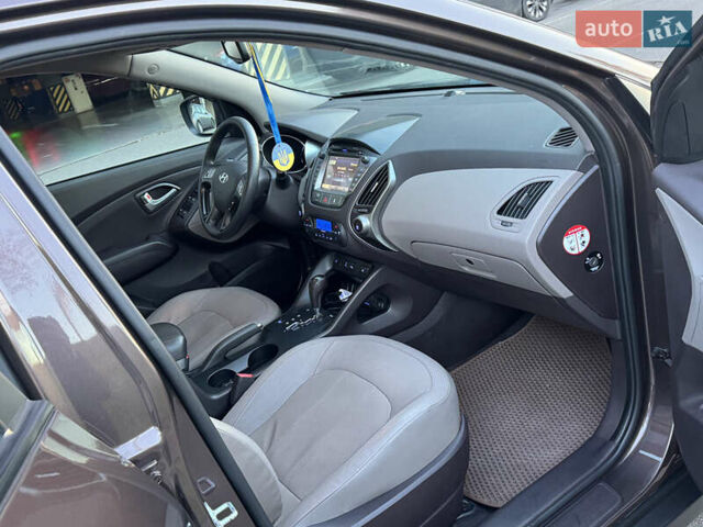 Коричневий Хендай іх35, об'ємом двигуна 2 л та пробігом 176 тис. км за 14500 $, фото 61 на Automoto.ua