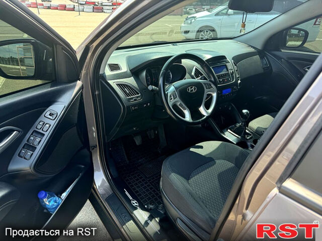 Коричневий Хендай іх35, об'ємом двигуна 1.7 л та пробігом 206 тис. км за 12600 $, фото 8 на Automoto.ua