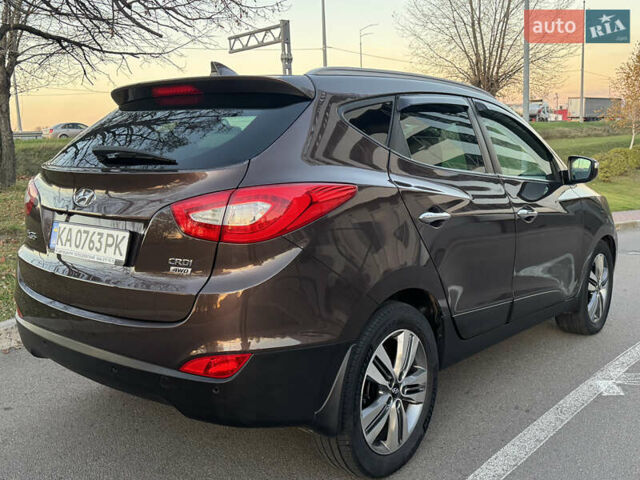 Коричневий Хендай іх35, об'ємом двигуна 2 л та пробігом 176 тис. км за 14500 $, фото 7 на Automoto.ua