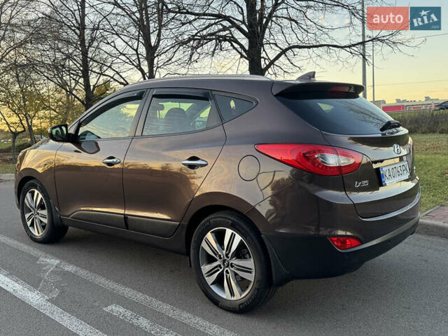 Коричневий Хендай іх35, об'ємом двигуна 2 л та пробігом 176 тис. км за 14500 $, фото 11 на Automoto.ua
