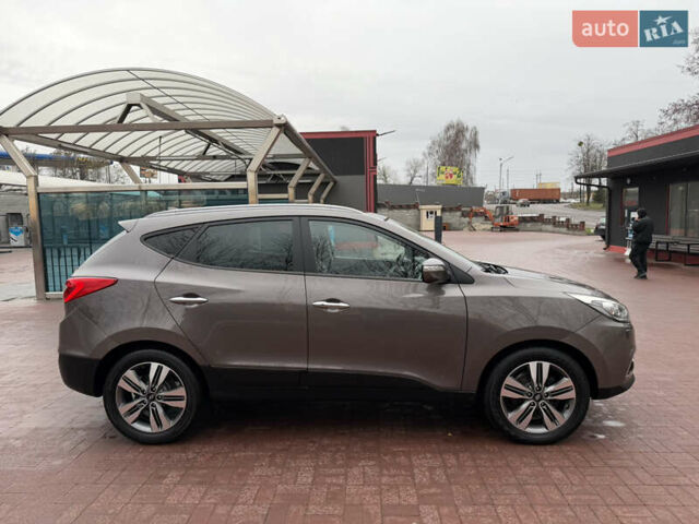 Коричневий Хендай іх35, об'ємом двигуна 2 л та пробігом 230 тис. км за 14300 $, фото 12 на Automoto.ua