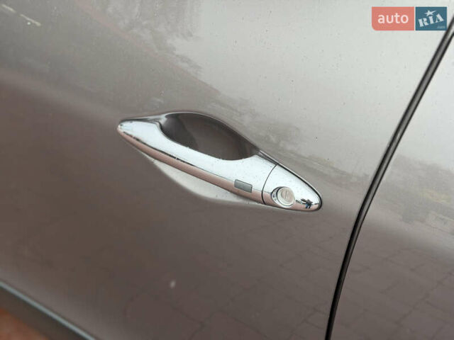 Коричневий Хендай іх35, об'ємом двигуна 2 л та пробігом 230 тис. км за 14300 $, фото 14 на Automoto.ua