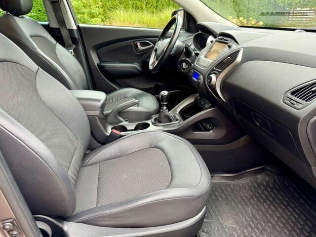 Коричневый Хендай их35, объемом двигателя 1.6 л и пробегом 144 тыс. км за 8800 $, фото 21 на Automoto.ua