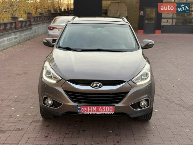 Коричневий Хендай іх35, об'ємом двигуна 2 л та пробігом 230 тис. км за 15300 $, фото 4 на Automoto.ua