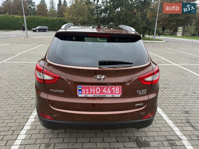 Коричневий Хендай іх35, об'ємом двигуна 2 л та пробігом 211 тис. км за 17400 $, фото 22 на Automoto.ua
