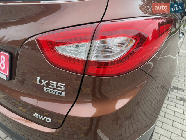 Коричневий Хендай іх35, об'ємом двигуна 2 л та пробігом 211 тис. км за 17400 $, фото 45 на Automoto.ua
