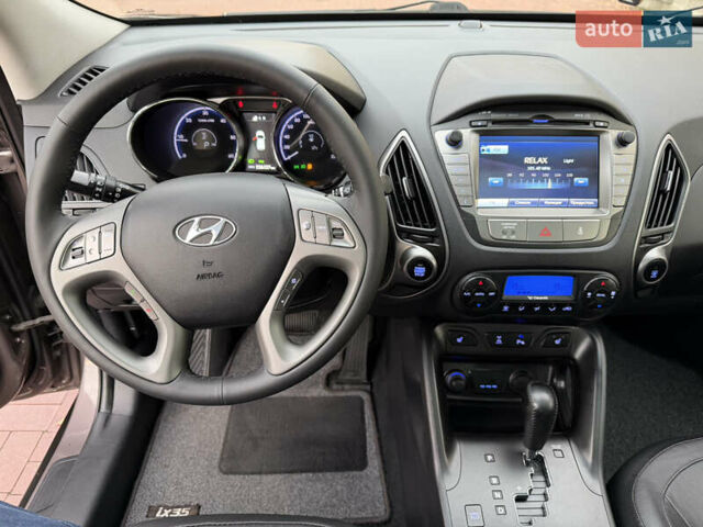 Коричневий Хендай іх35, об'ємом двигуна 2 л та пробігом 230 тис. км за 15300 $, фото 67 на Automoto.ua